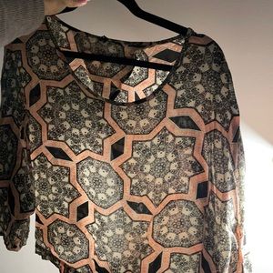 Feminine blouse with open back tie